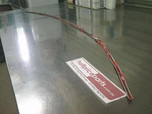 Mitsubishi NL/NL/NM Pajero Genuine Front Flare Seal (Factory Silver) New Part