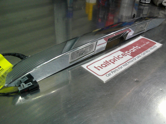Holden TM Barina Genuine Chrome Rear Tail Gate License Plate Light Moulding New Part