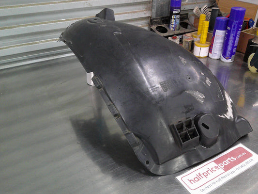 Holden AH Astra Genuine Left Hand Front Splash Guard (Rear Half) New Part.