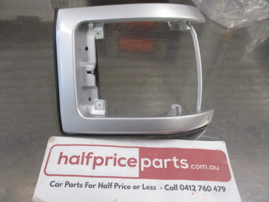 Ford Econovan Genuine Silver/Left Hand Front Corner Lamp Trim New Part