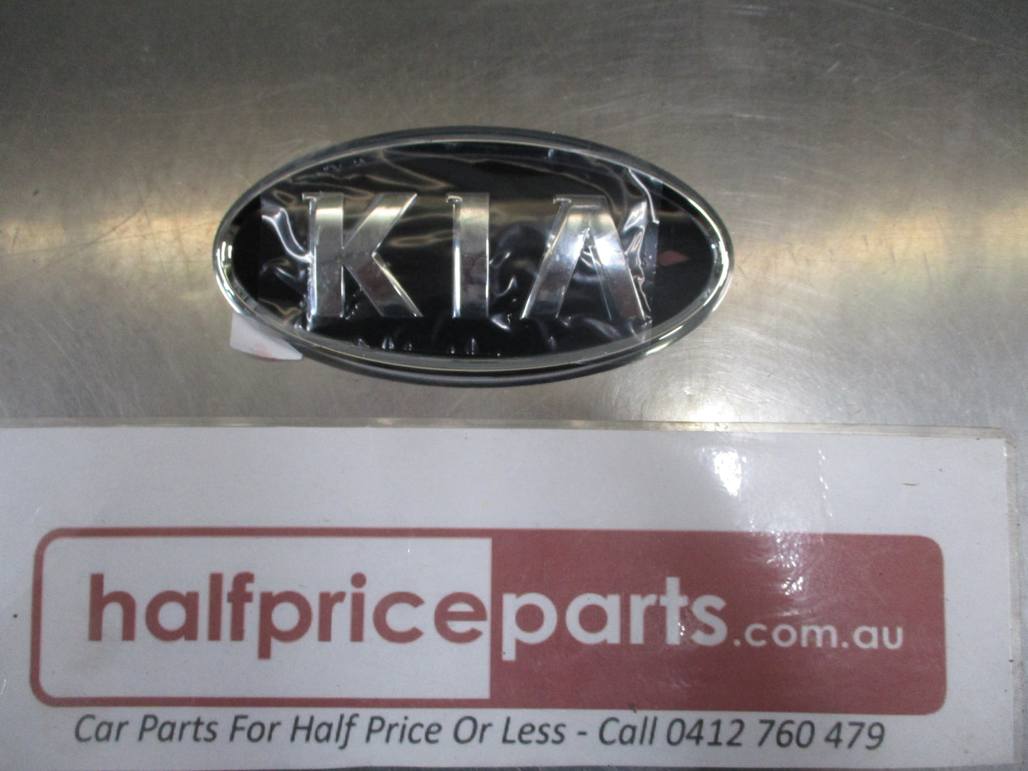 Kia Sportage Genuine rear tailgate garnish/number plate light holder with badge New Part
