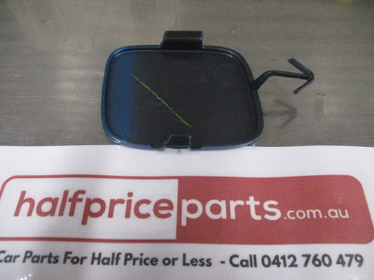 Mitsubishi Mirage Genuine Front Bumper Tow Eye Cover Trim (Factory Blue) New Part