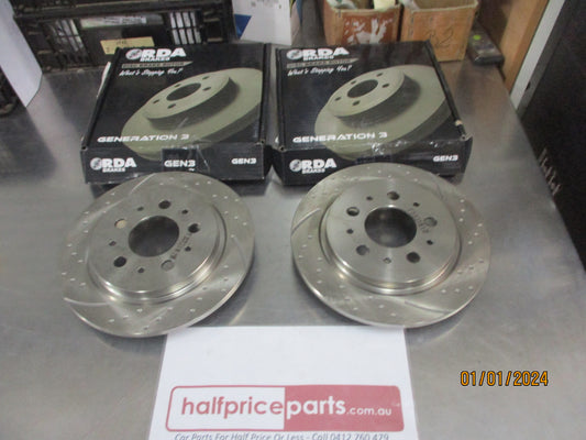 RDA Rear Disc Brake Rotors (Pair) Slotted-Dimpled Suits Volvo 760 New Part