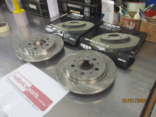 RDA Rear Disc Brake Rotors (Pair) Slotted-Dimpled Suits Volvo 760 New Part