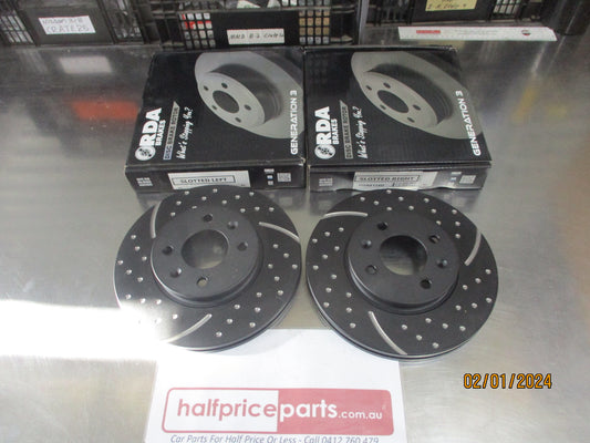 RDA Front Disc Rotors (Pair) Slotted-Dimpled Suits Hyundai Accent RB/Kia Rio New Part