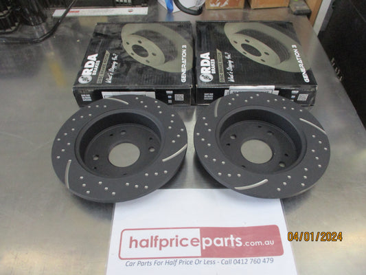 RDA Rear Disc Rotors (Pair) Slotted-Dimpled Suits Honda Accord CB/CC New Part