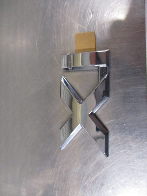 Mitsubishi Magna/Verada Genuine Chrome Xi Emblem New Part