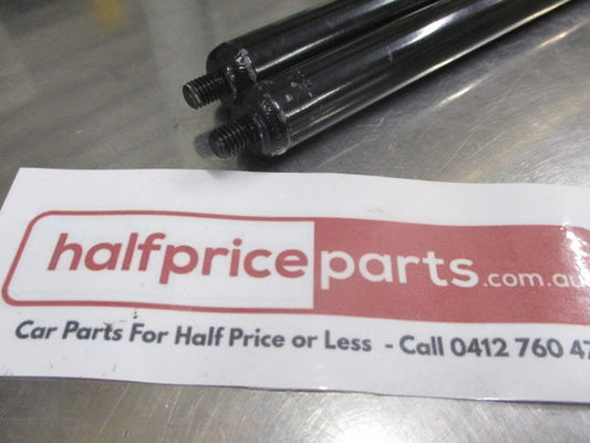 Mitsubishi ML Triton Genuine (Pair) Bonnet Gas Struts New Part
