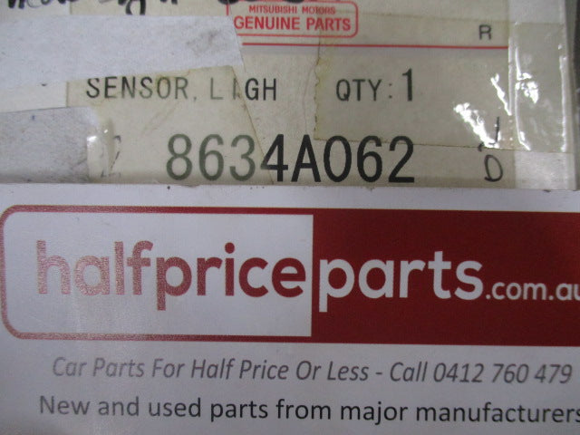 Mitsubishi Lancer/Outlander Genuine Automatic Lighting Control Sensor (Includes Rain Sensor) New Part