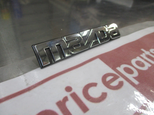 Mazda Protege Genuine Rear Emblem Badge (Chrome And Black) New Part