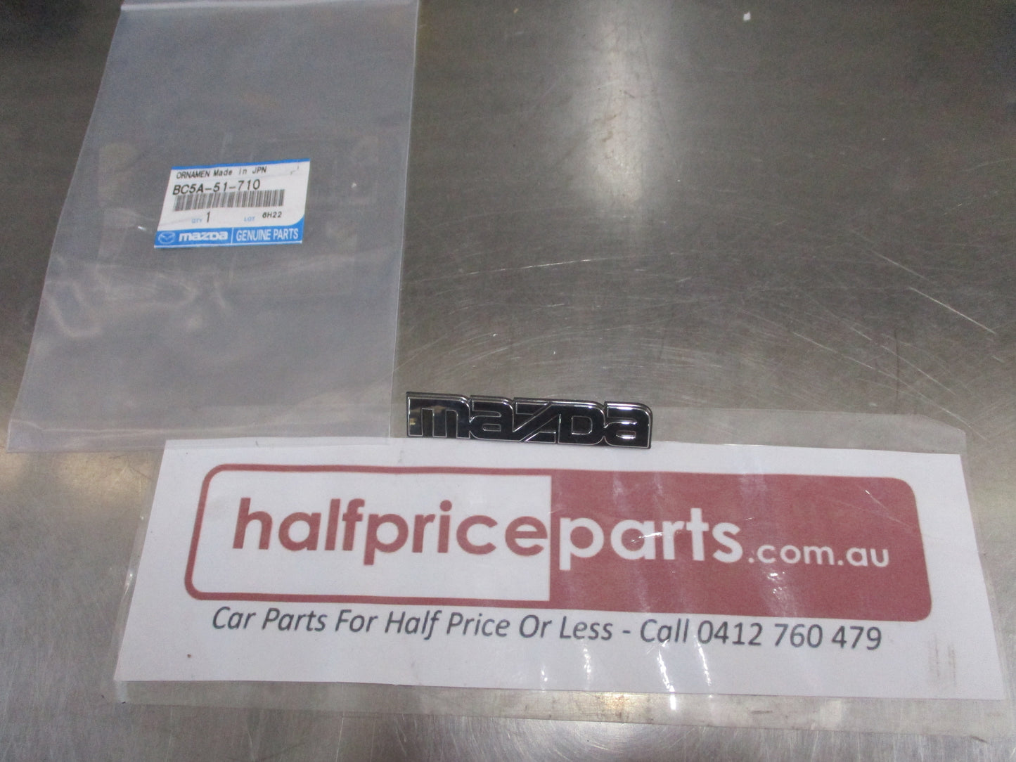 Mazda Protege Genuine Rear Emblem Badge (Chrome And Black) New Part