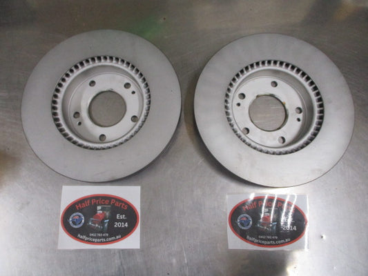 Hyundai Tuscon/Sonata/Kia/Magentis/Optima/Rondo/Soul Genuine Front Brake Rotors Pair New Part