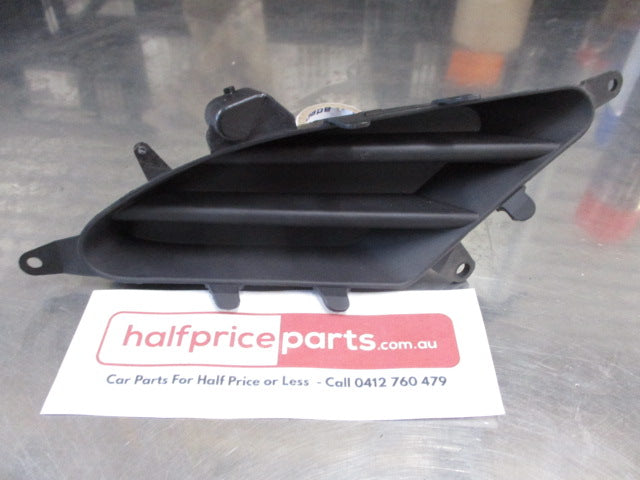 Mitsubishi 380 Genuine Left Front Fog Light Bezel Genuine New Part