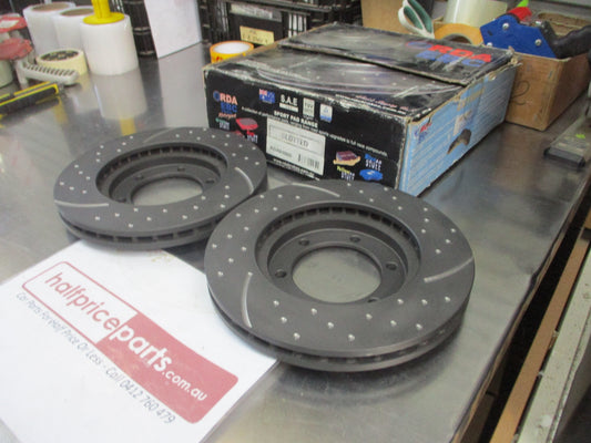 RDA Front Disc Brake Rotors (Pair) Slotted-Dimpled Suits Nissan Navara D22 New Part