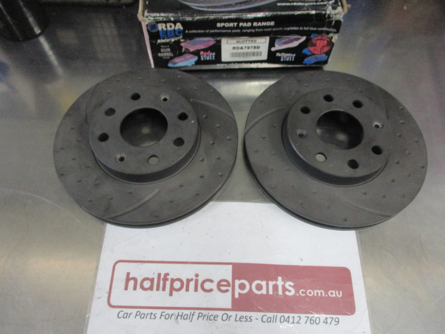 RDA Front Disc Brake Rotors (Pair) Slotted-Dimpled Suits Holden Barina TK New Part
