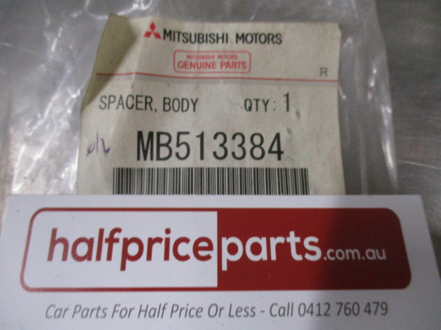 Mitsubishi Triton/Challenger Genuine Body Mounting Spacer New Part