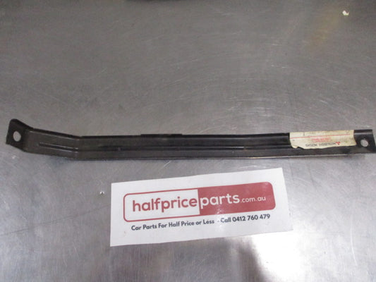 Mitsubishi Lancer/Mirage Genuine Front Lower Bumper Bracket New Part