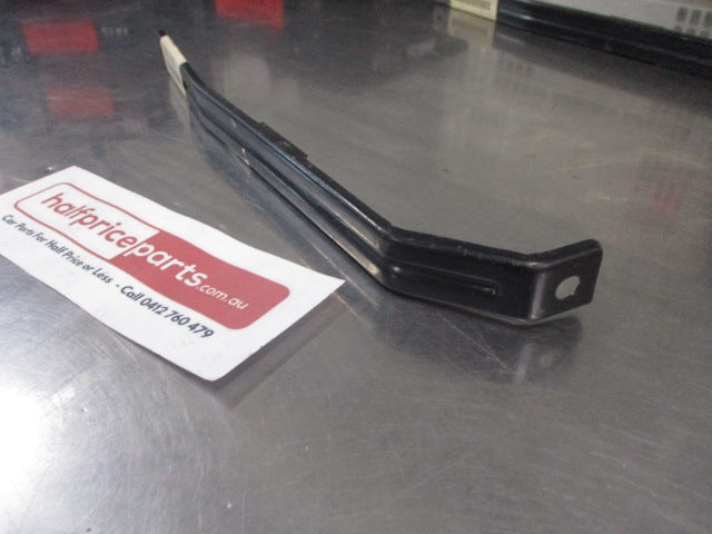 Mitsubishi Lancer/Mirage Genuine Front Lower Bumper Bracket New Part