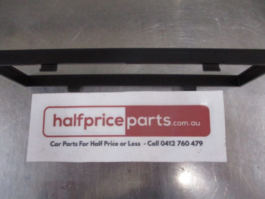 Mitsubishi Triton Genuine Centre Compartment Instrument Surround Cover New Part