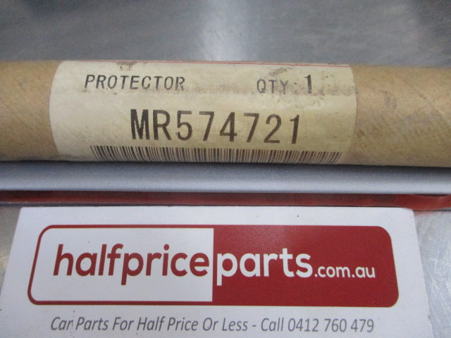 Mitsubishi Pajero Genuine Front Flare Seal (Silver) NOS New Part