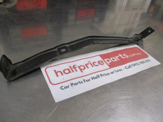 Mitsubishi Magna Genuine Front Bumper Cover Side Bracket New Part