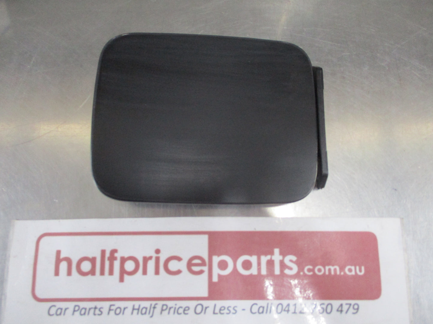Hyundai Excel Genuine Fuel Filler Door Assembly (Unpainted) New Part