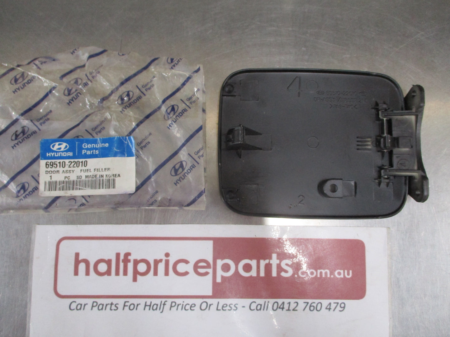 Hyundai Excel Genuine Fuel Filler Door Assembly (Unpainted) New Part