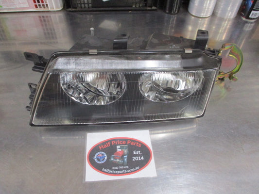 Mitsubishi Magna TE Verada Sedan Genuine Left Hand Headlight New Part