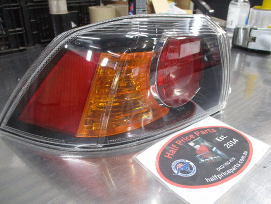Mitsubishi Lancer CJ Genuine Left Hand Tail Light Assembly New Part