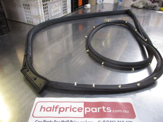 Mitsubishi Evolution/Lancer Genuine Left Hand Front Door Weather Strip New Part