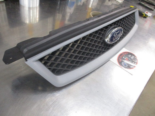Ford Focus LS/LT Genuine Front Grille (In Factory Primer) New Part