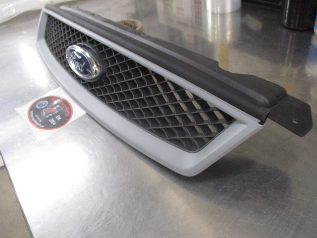 Ford Focus LS/LT Genuine Front Grille (In Factory Primer) New Part