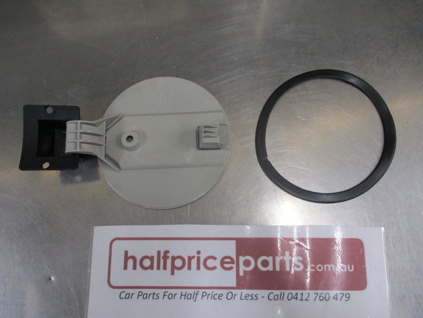 Holden VT/VX/VY/VZ Commodore Wagon (Only) Genuine Fuel Filler Flap Assembly with Seal (Unpainted) New Part