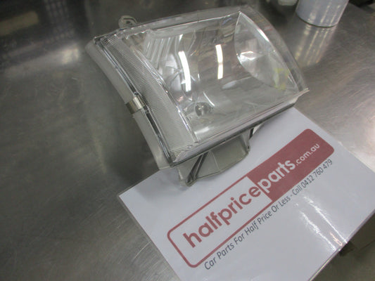 Mazda B2200-B2500-B2600 Genuine Right Hand Headlight Used VGC.