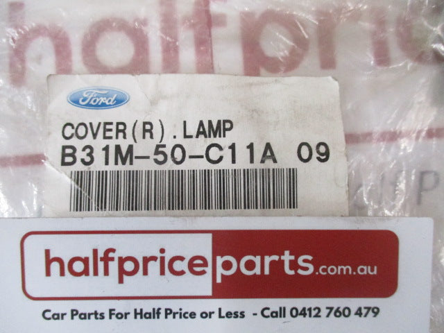 FORD LASER KQ/KN Genuine Right Hand Fog Lamp Cover - New Part