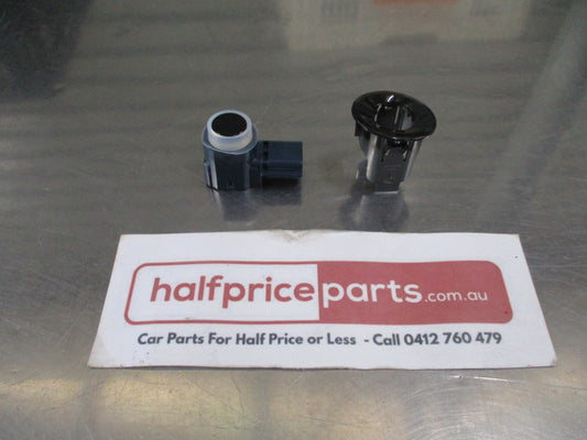 Mitsubishi Pajero Genuine Front Corner Parking Sensor/Holder (Black) New Part.
