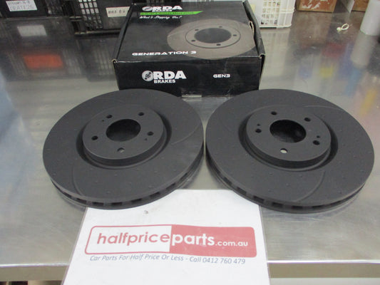 RDA Front Disc Brake Rotors (Pair) Slotted-Dimpled Suits Mitsubishi EVO V-IX New Part
