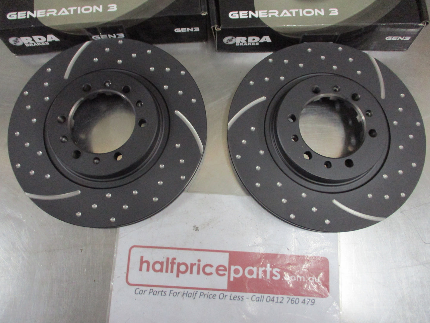 RDA Front Disc Brake Rotors (Pair) Slotted-Dimpled Suits Mitsubishi Triton MK 2WD-4WD New Part