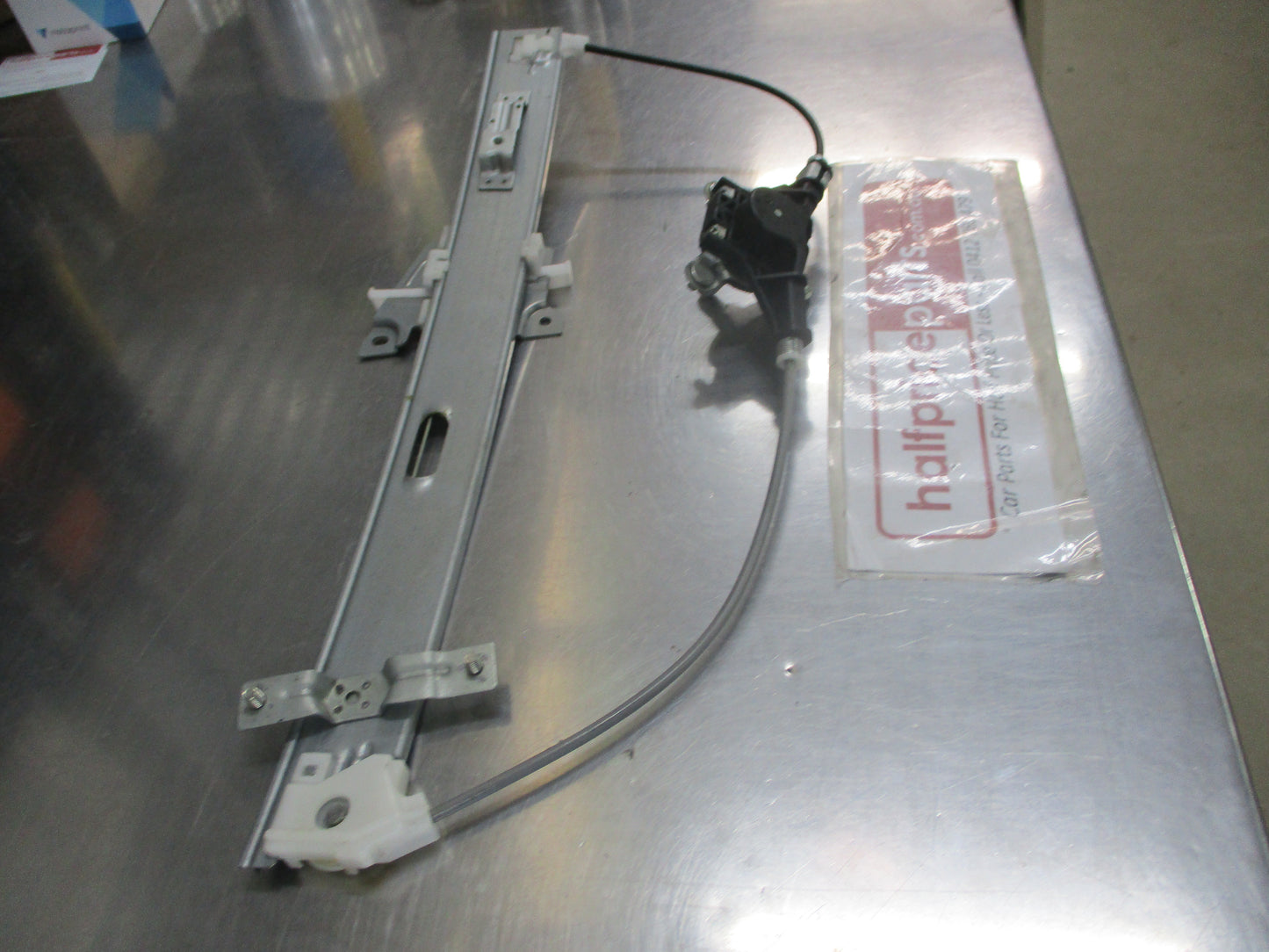 Mazda Protege Genuine Drivers Front Window Regulator (With Out Power Windows) New Part