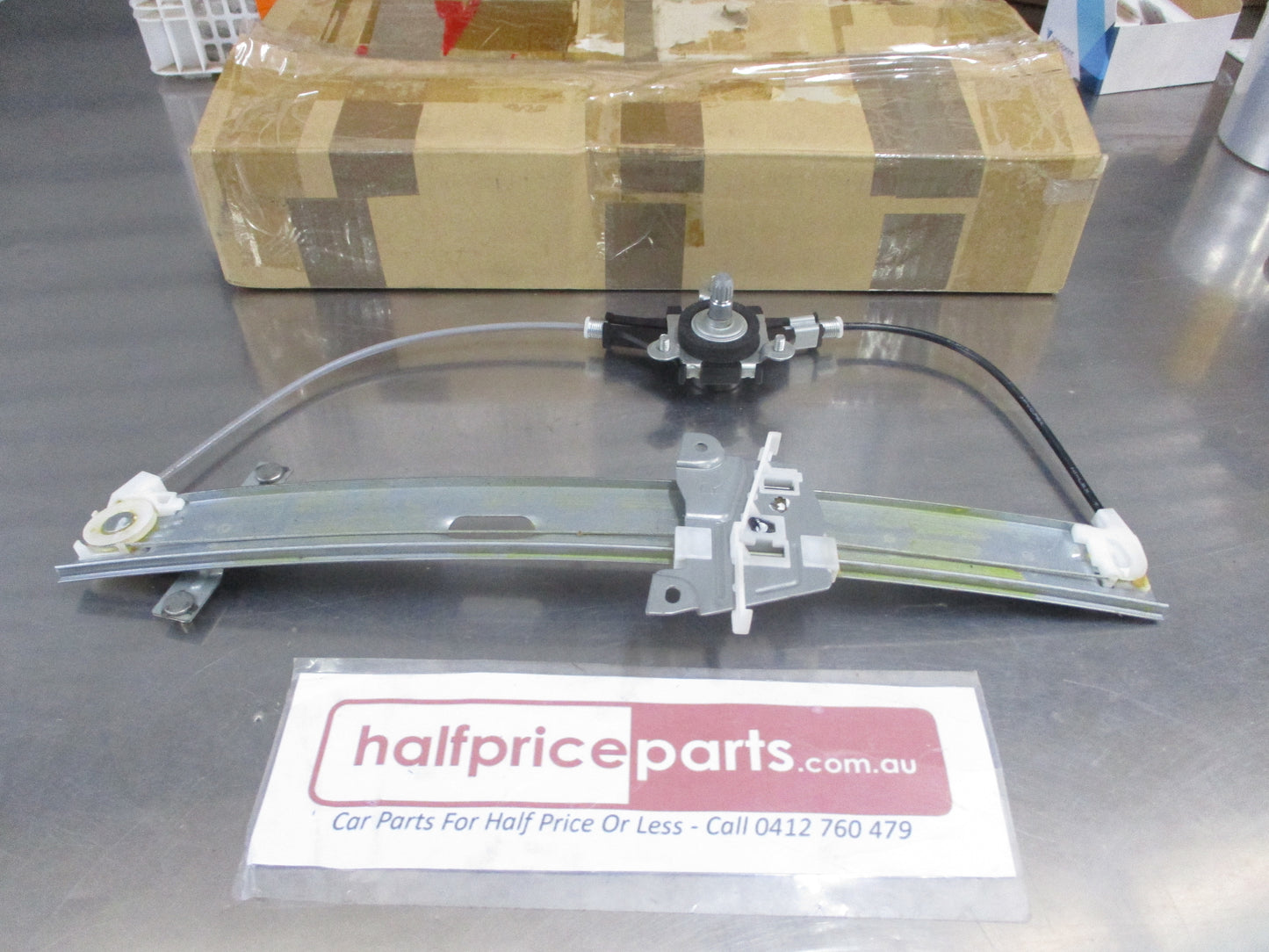 Mazda Protege Genuine Drivers Front Window Regulator (With Out Power Windows) New Part