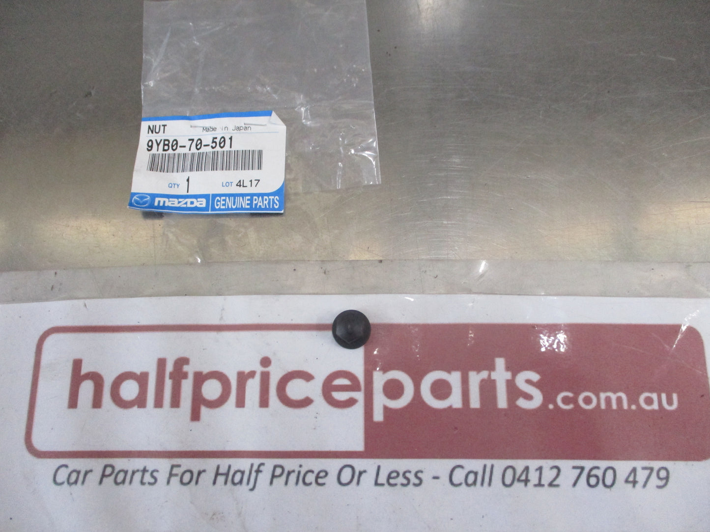 Mazda 3/Millenia Genuine Lens And Housing Nut New Part