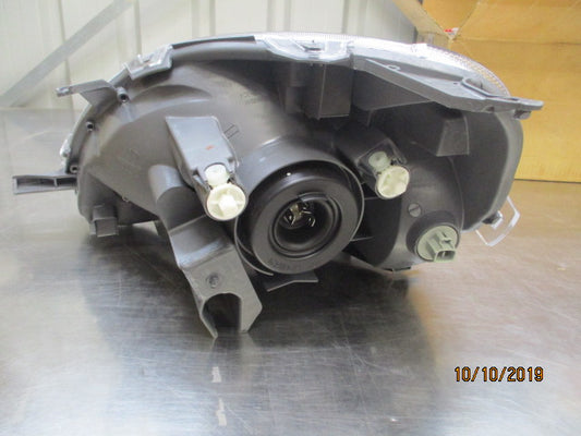 Toyota Echo Genuine Right Hand Front Headlight New Part.