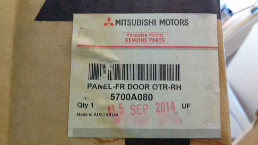 Mitsubishi 380 genuine right hand front door skin new part