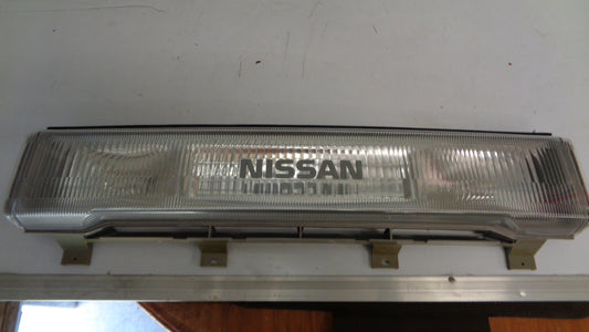 NISSAN NOMAD_VANETTE GENUINE HEADLAMP FINISHER/GRILLE NEW PART