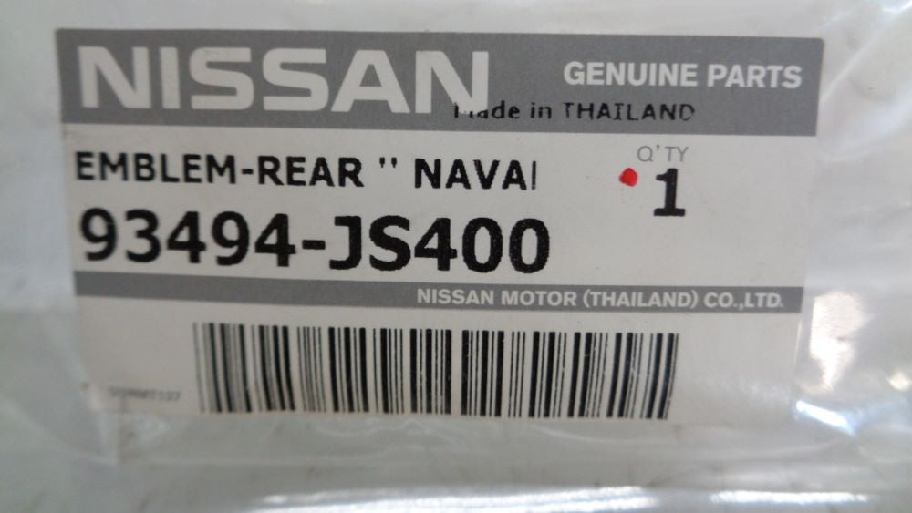 Nissan Navara D40M Genuine tailgate emblem new part