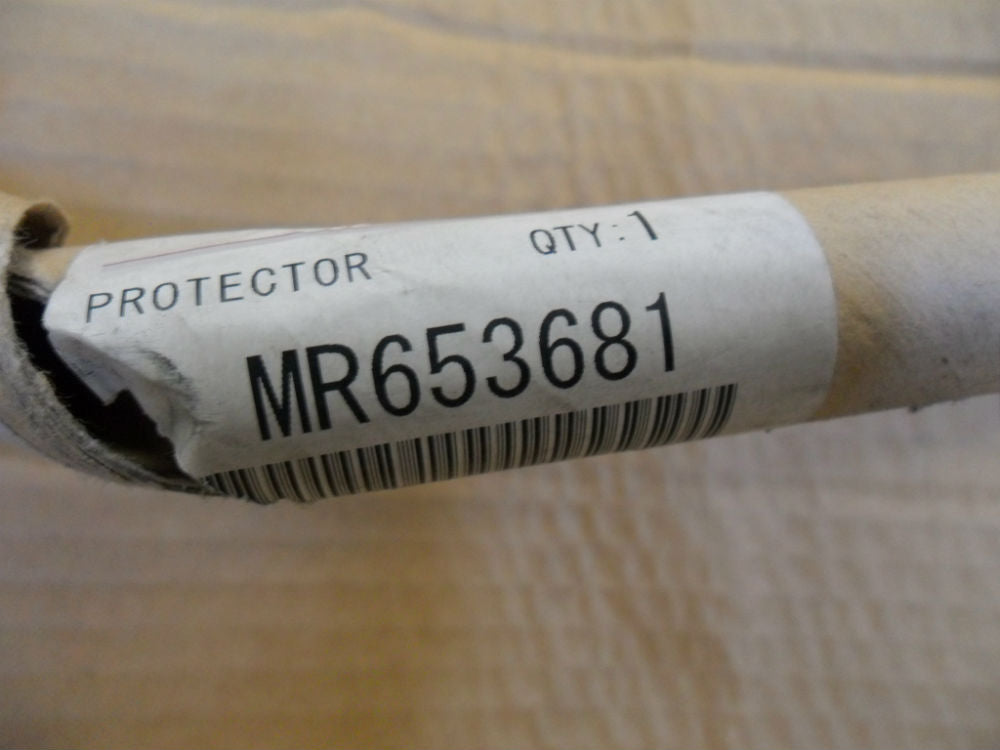 Mitsubishi Triton Genuine Front Flare Seal (Blue) New Part