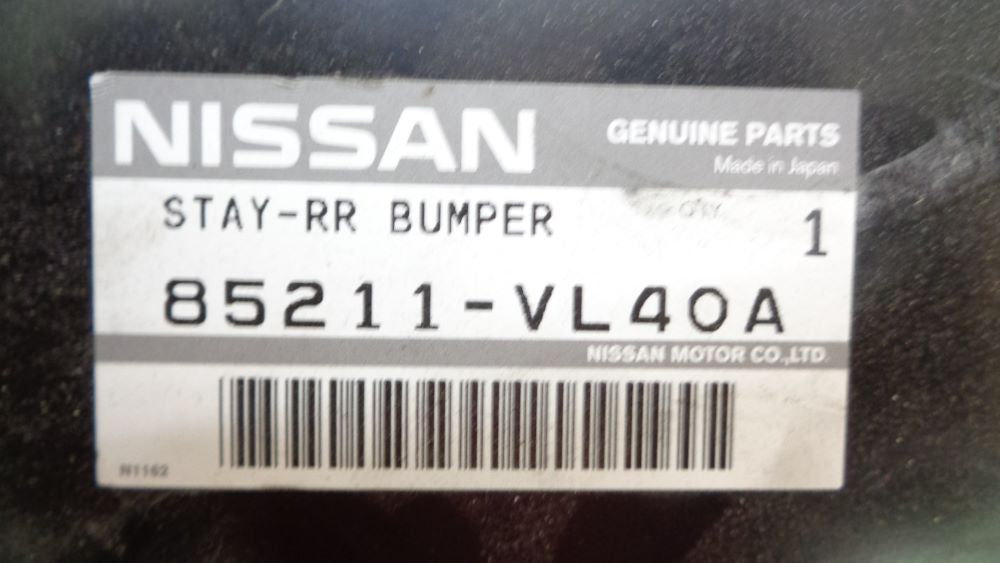 Nissan Navara Genuine left hand rear bumper stay new part