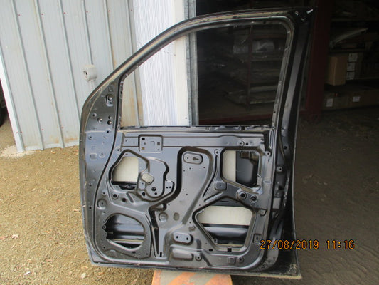 Nissan Navara D40T Single cab Genuine Front Left Hand Door New Part.