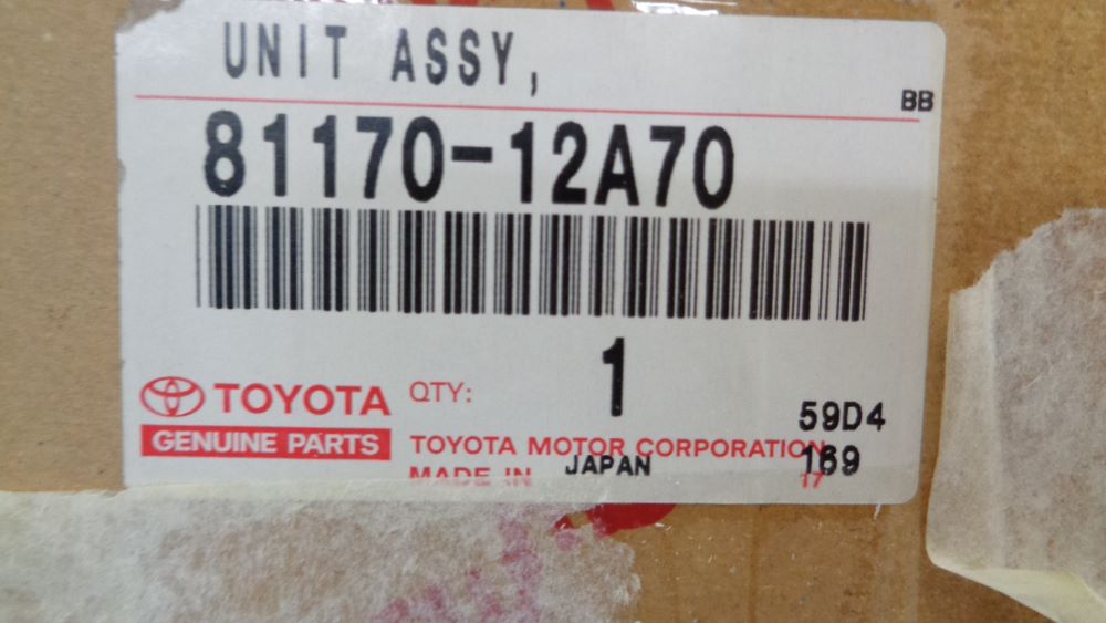 Toyota Corolla Sedan Genuine left hand headlight new part