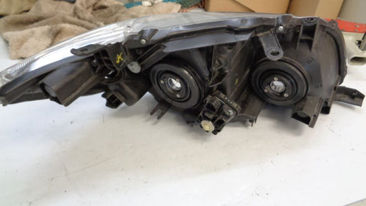 Toyota Corolla Sedan Genuine left hand headlight new part